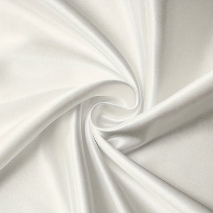 Taie d'oreiller en satin Maison Satinéa, surface lisse qui limite les frottements